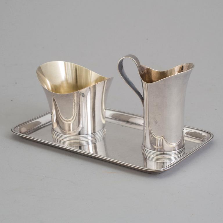 GAB, a silver creamer and sugarbowl with tray, Stockholm, 1961.