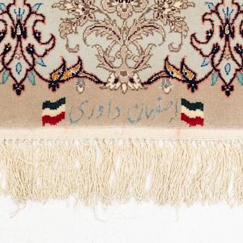 A part silk Isfahan rug, signed, c. 125 x 84 cm.