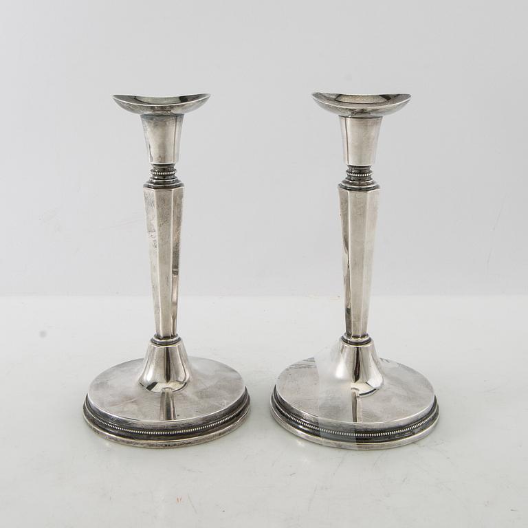 Eric Löfman, candlesticks, a pair, silver, MGAB, Uppsala, 1974.