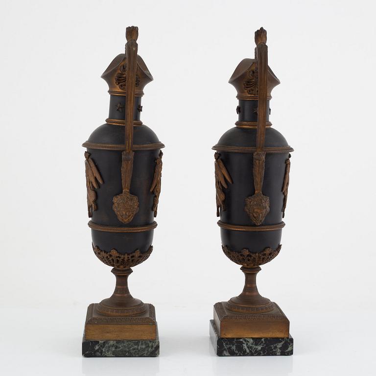 A pair of empire style decoration urns, 19th century.