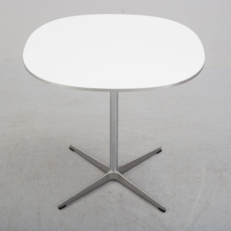 A 'Supercirkel' table by Bruno Mathsson & Piet Hein, Denmark, 1978.