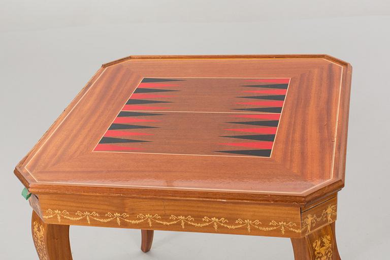 A gaming table and two chairs from Italy, 1950s.