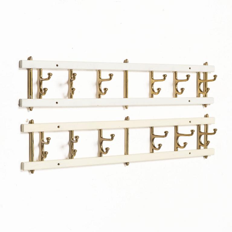 Coat hangers, a pair, “Dekorativ”, Skoglunds Metallgjuteri, Anderstorp, mid-20th century.