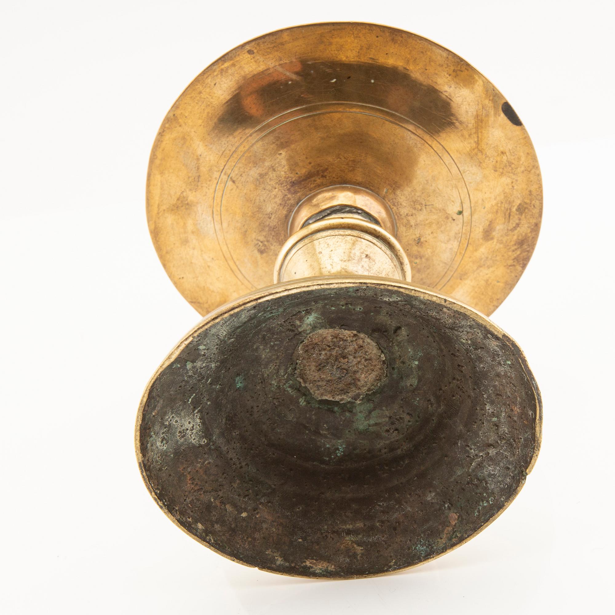 Candle holder possibly from the 17th century, brass.