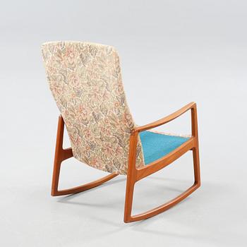 A rocking chair by Ole Wanscher for France & son from Denmark from the second part of the 20th century.