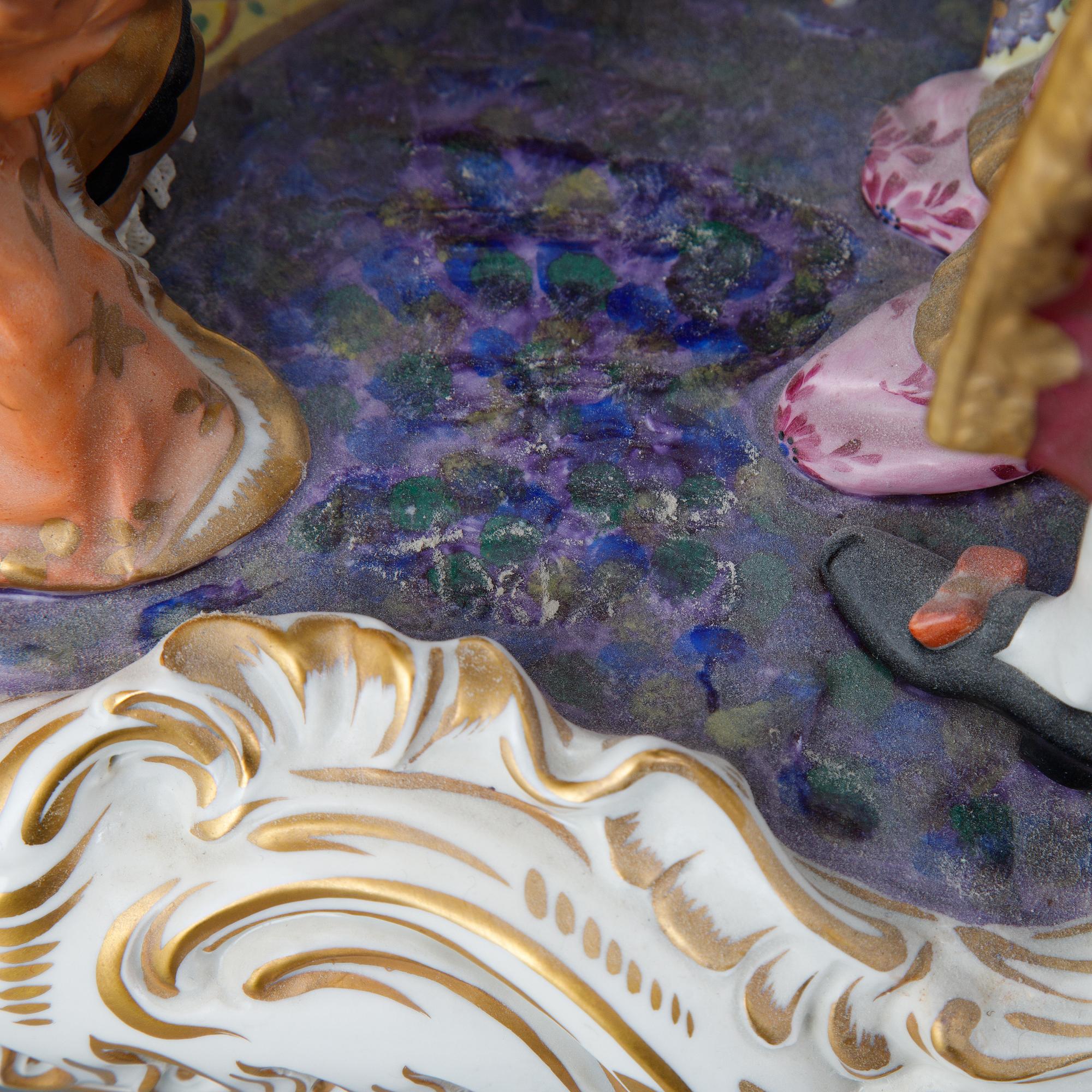 A Rococo style porcelain figurine group, Rudolstadt Volkstedt, Germany, early 20th Century.