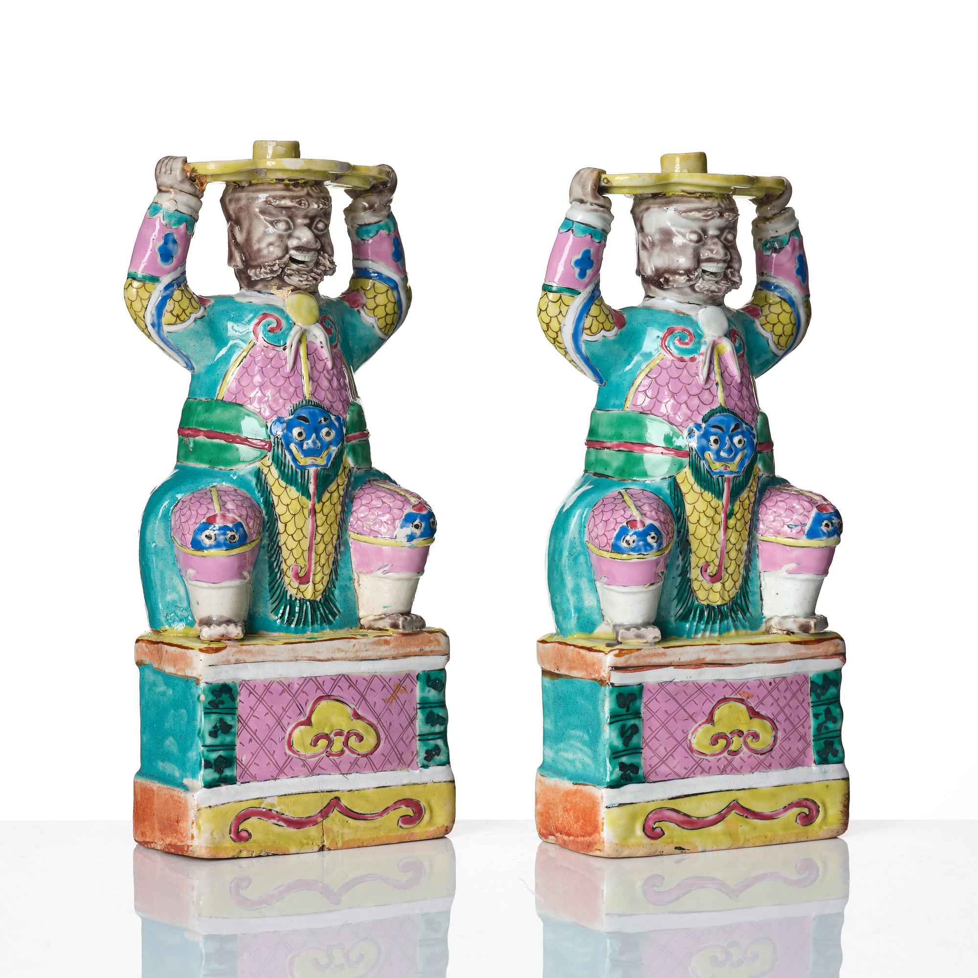 A pair of famille rose candlesticks, Qing dynasty, Qianlong (1736-95).