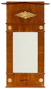 An Empire mahogany mirror, 19th Century.