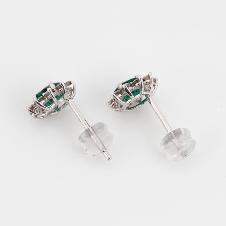 Emerald and brilliant-cut diamond cluster earrings.