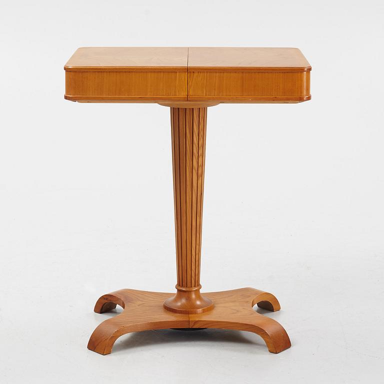 A Swedish Modern elm sewing table, Svenska Möbelfabrikerna, Bodafors, 1940's.