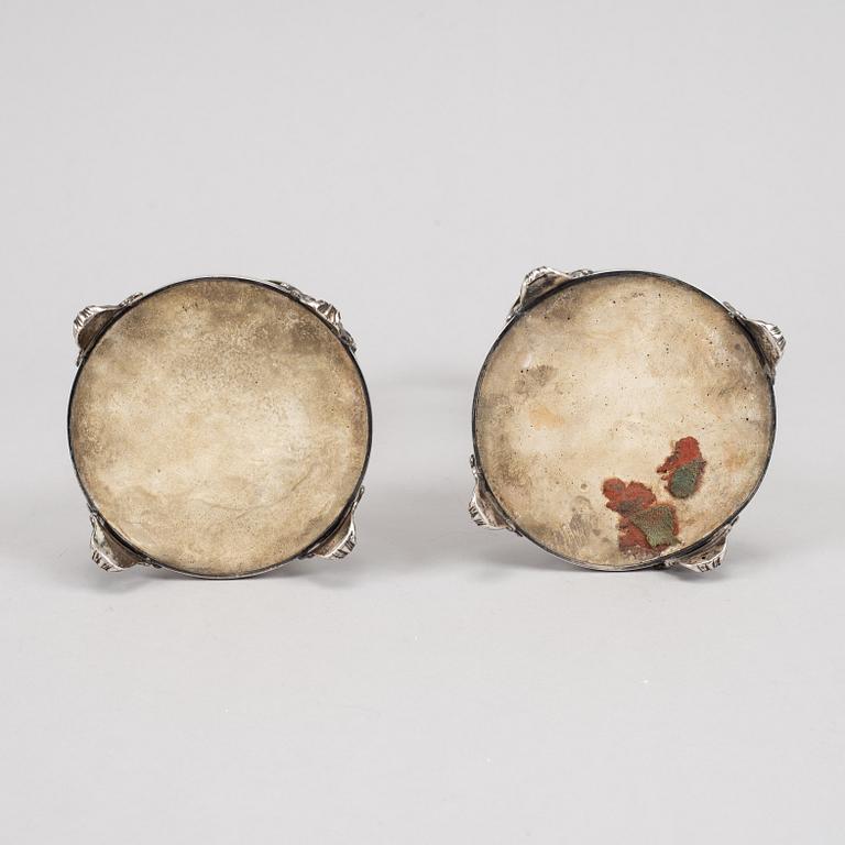 A pair of swedish silver candlesticks, mark of Guldsmedsaktiebolaget GAB, Stockholm 1882.
