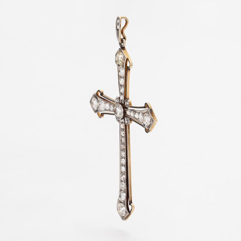 An 18K gold cross pendant with old-cut diamonds ca. 5.43 ct in total. With certificate.