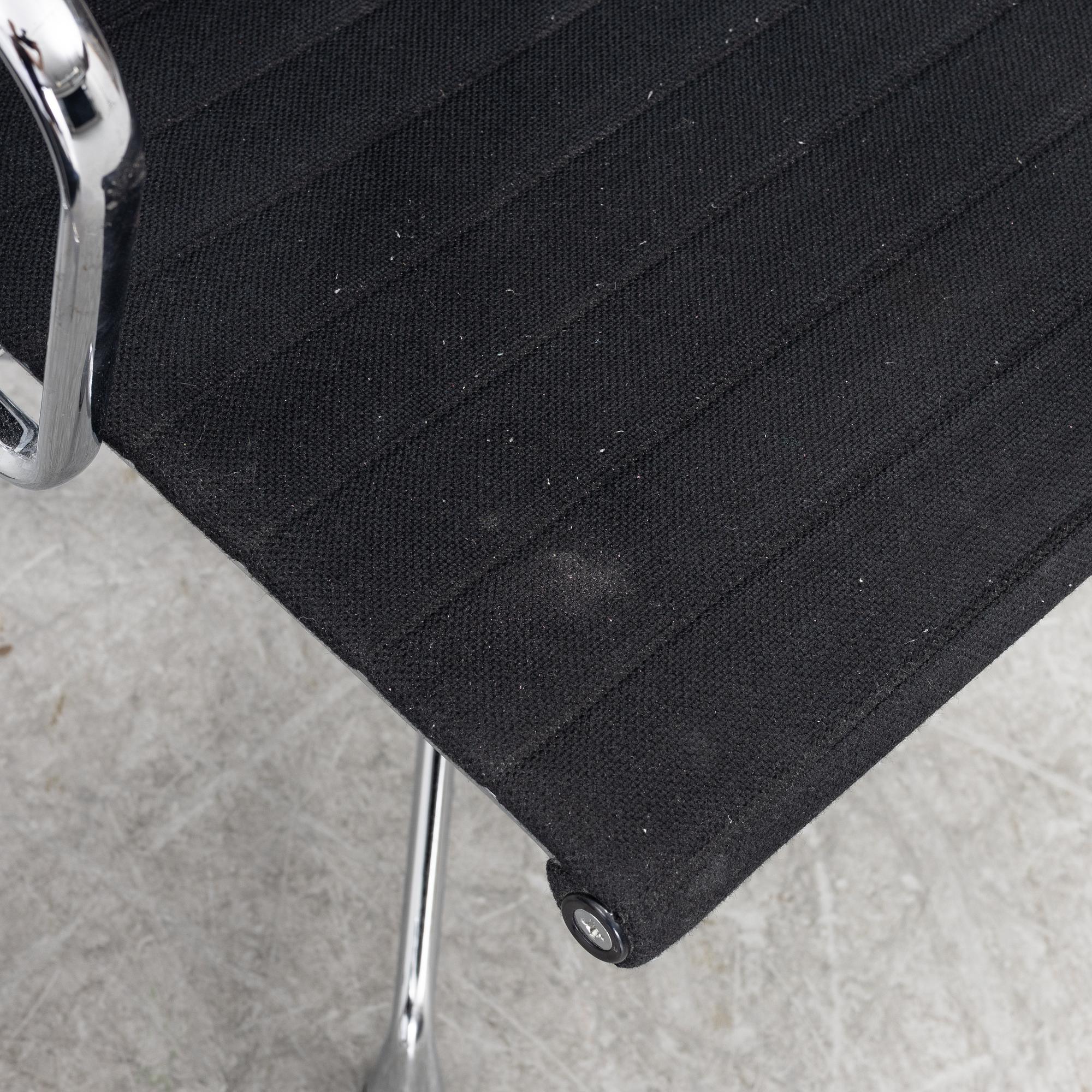 Charles & Ray Eames, A pair of EA 108 armchairs, Vitra.