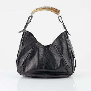 Yves Saint Laurent, a 'Mombasa' leather bag.