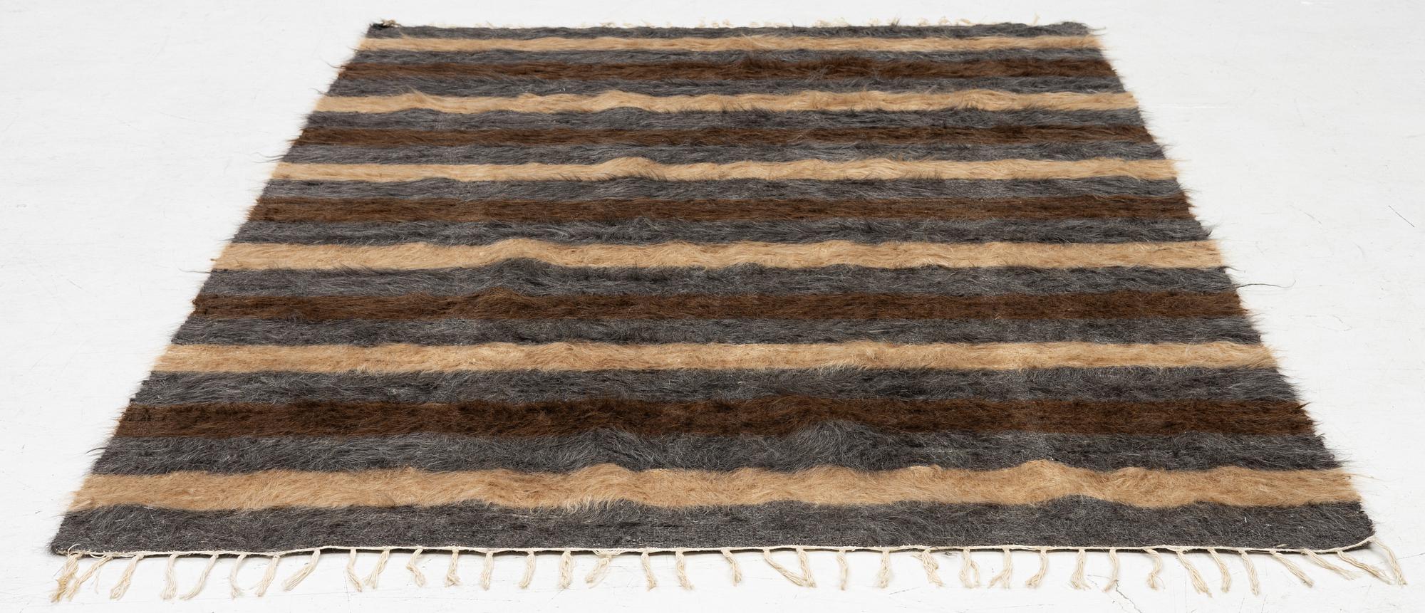 A Turkish 'Mohair' rug, c. 200 x 133 cm.