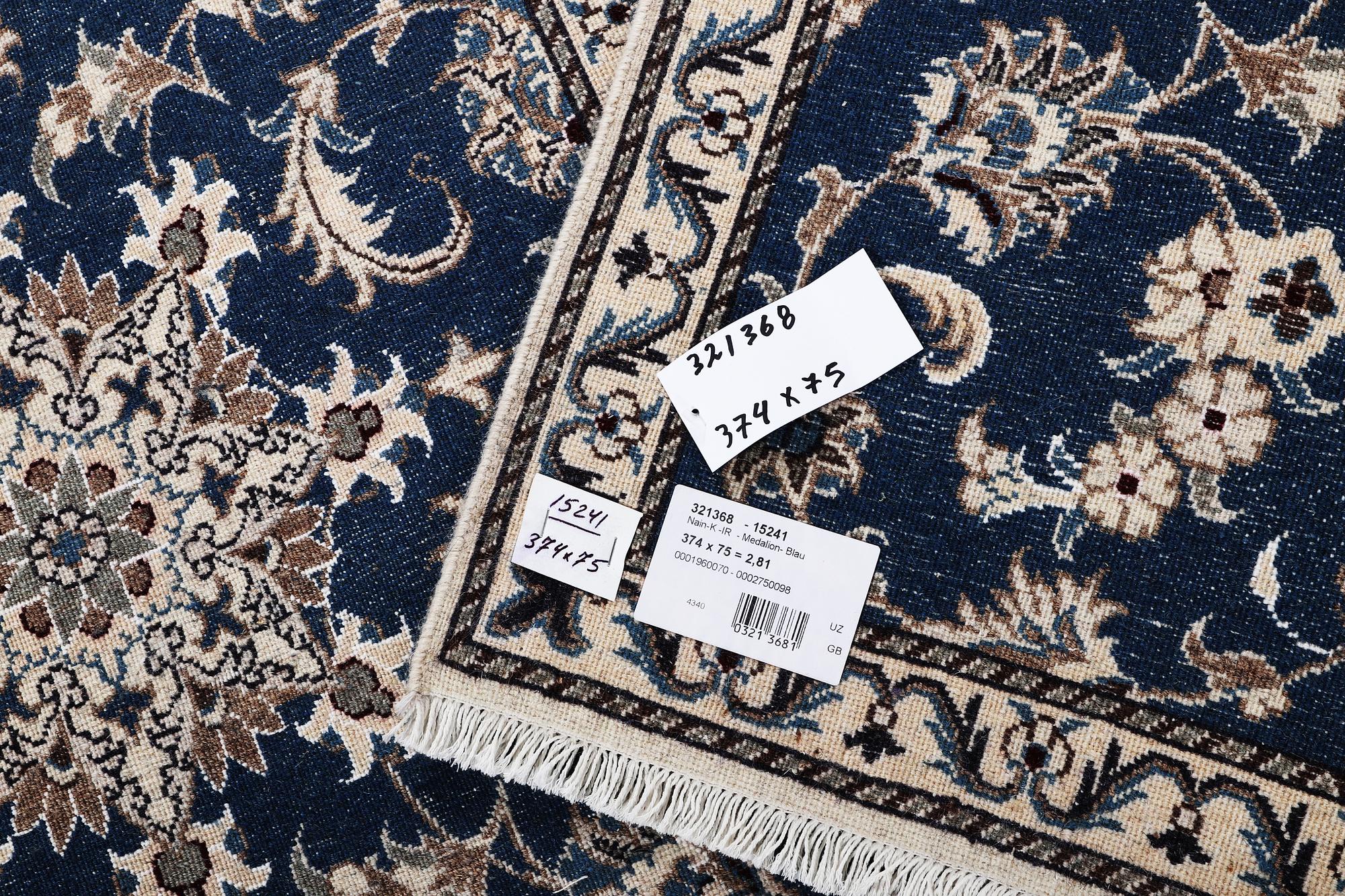 A runner carpet, Nain, part silk, ca 374 x 75 cm.