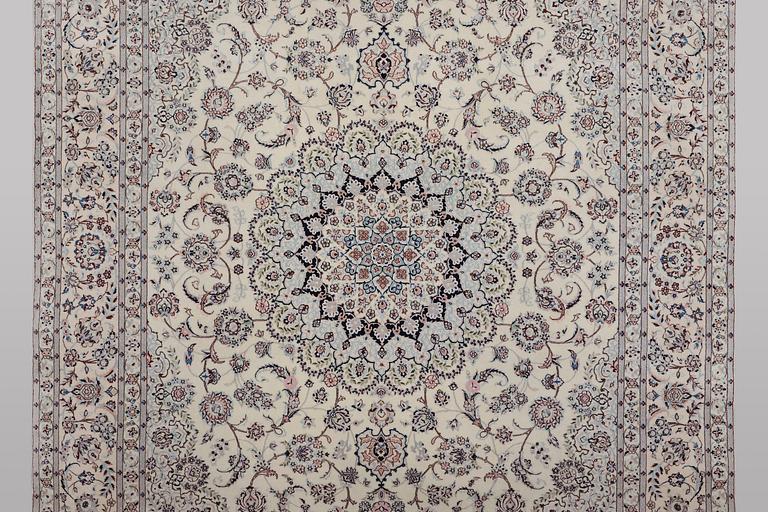 A carpet, Nain, part silk, ca 341 x 245 cm.
