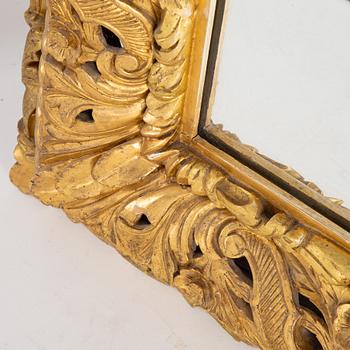 A baroque style mirror, firts hal of the 20th century.