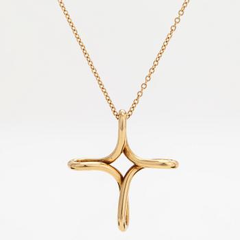 Tiffany & Co, Elsa Peretti, an 18K gold 'Infinity Cross' necklace.