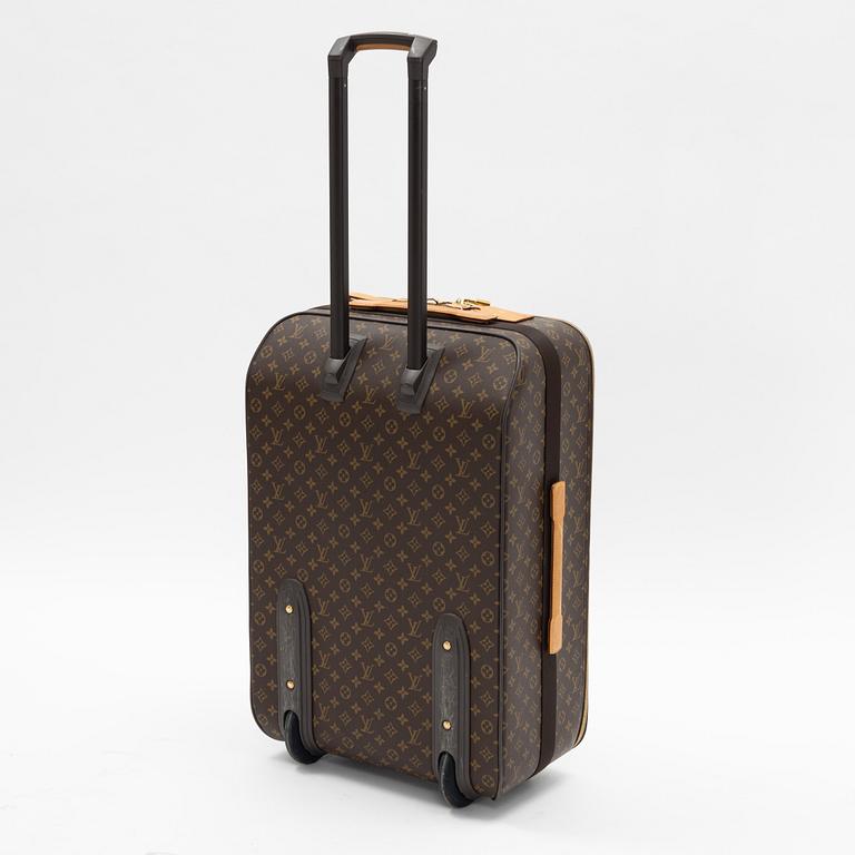 Louis Vuitton, a monogram canvas 'Pégase 65' suitcase.