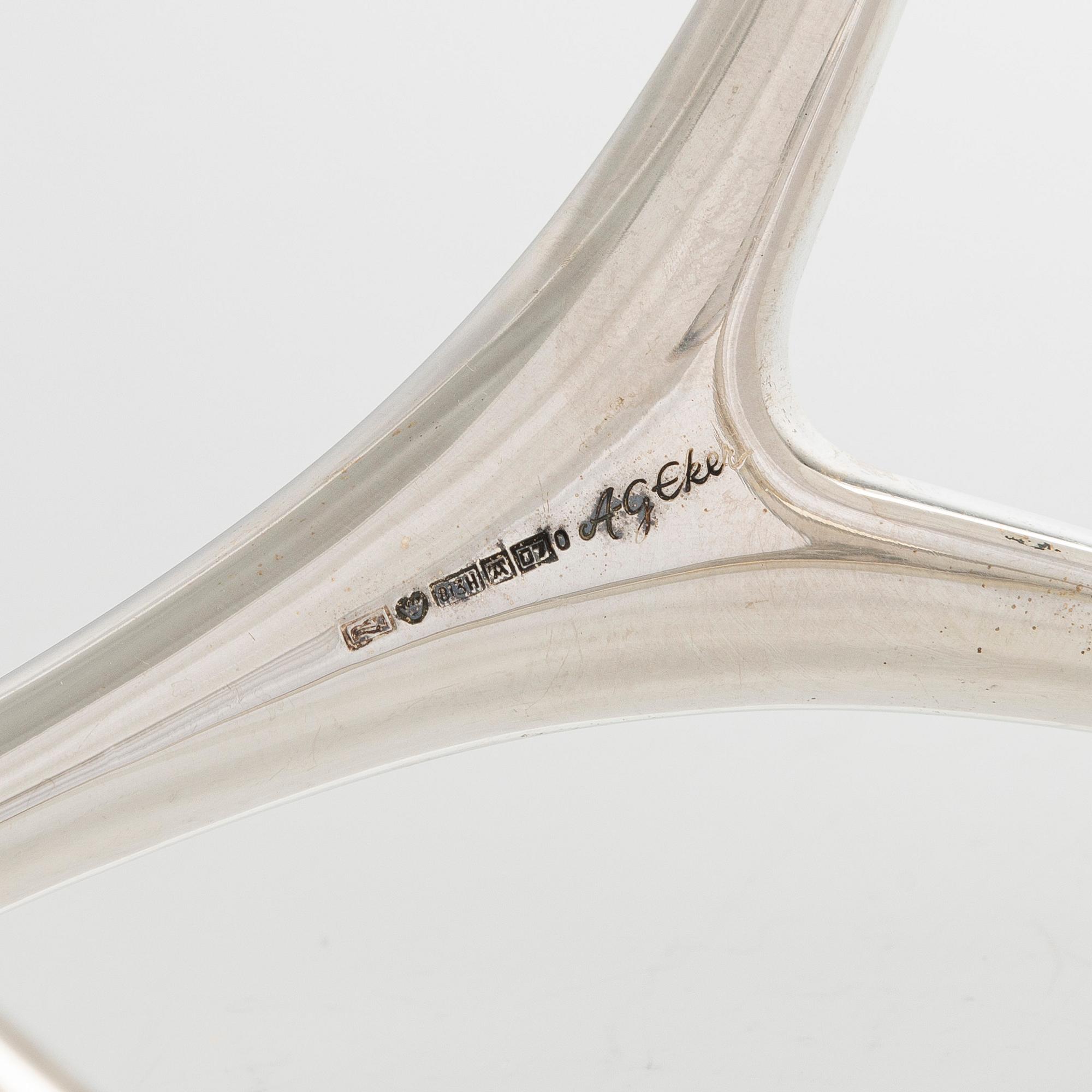 Anna-Greta Eker, a three-armed silver candelabrum, Auran Kultaseppä Oy, Turku, Finland 1967.