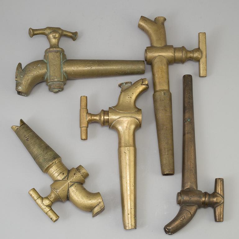 FIVE 19TH CENTURY BRONZE TAPS.