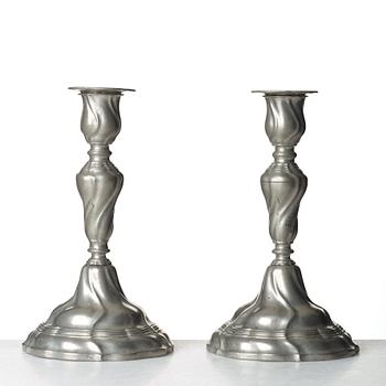 A pair of Swedish Rococo pewter candlesticks by E P Krietz, made in Stockholm 1772.