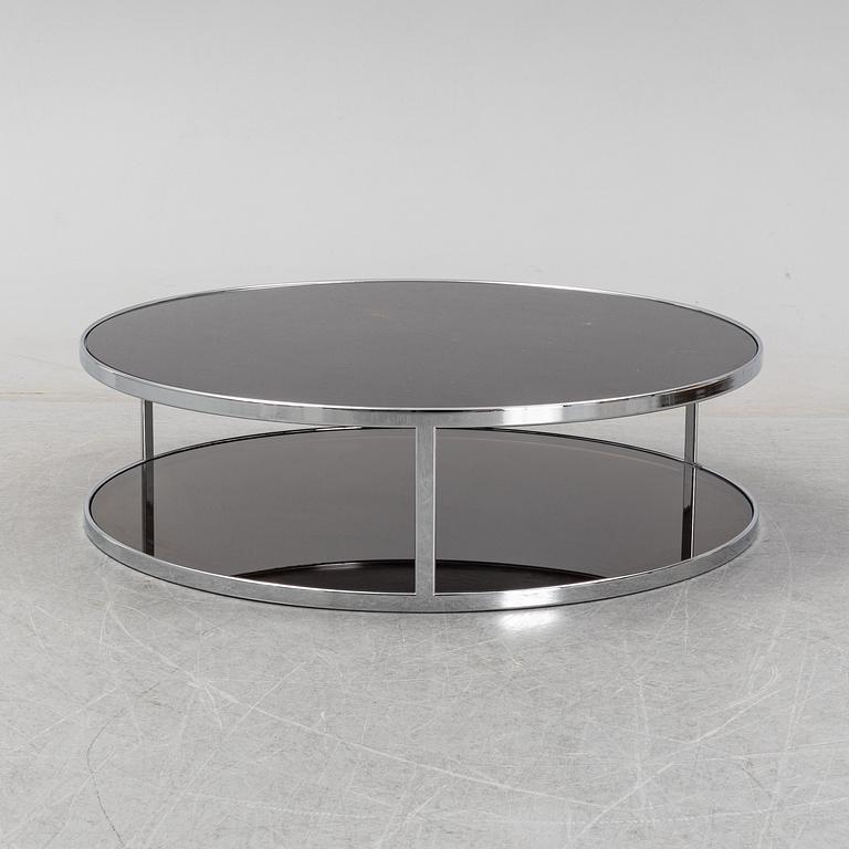 Rodolgo Dordoni, a 'Huber glass and chrome coffe table for Minotti.