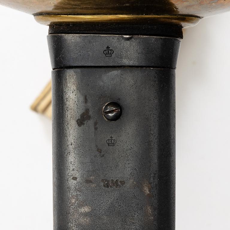 A Swedish 1893 pattern cavalry sabre, with scabbard.