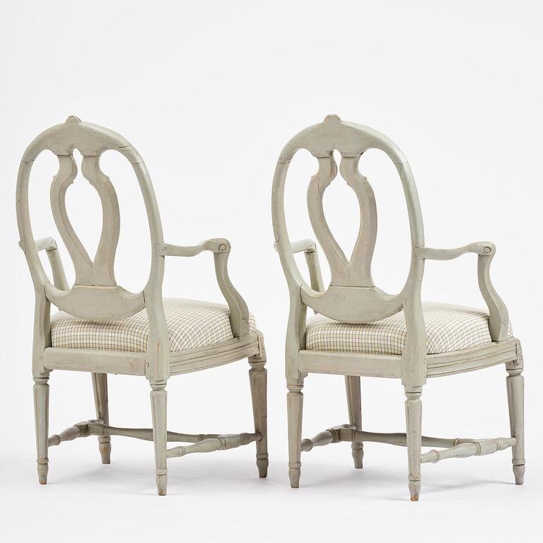 A pair of Gustavian open armchairs, Stockholm, late 18th century.