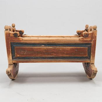 A cradle dated 18.9 1845.