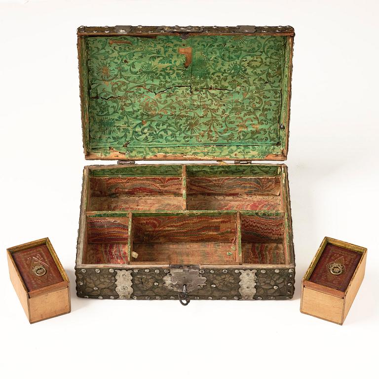 A presumably German baroque repoussé brass writing box, late 17th century.