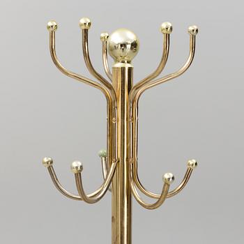 A late 20th century brass coat hanger.