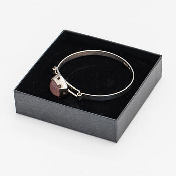 A silver bracelet with a rose quarts. Martti Viikinniemi, Heinola 1966.
