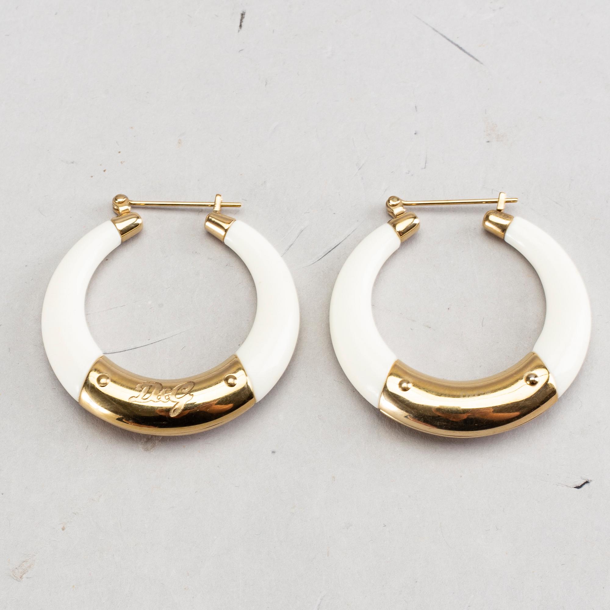 A pair of Dolce & Gabbana earrings.