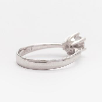 Bucherer, ring, 18K vitguld med briljantslipad diamant 1,02 ct. SJL certifikat.