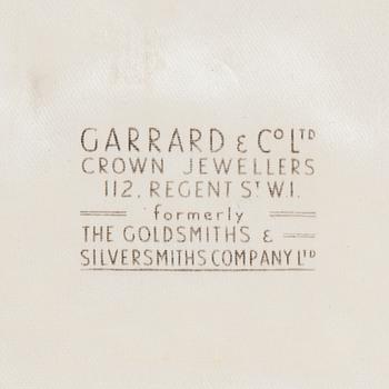 A diamond and sapphire set, probably Garrard & co. The set can be worn as a necklace, earrings, double clip or brooch.