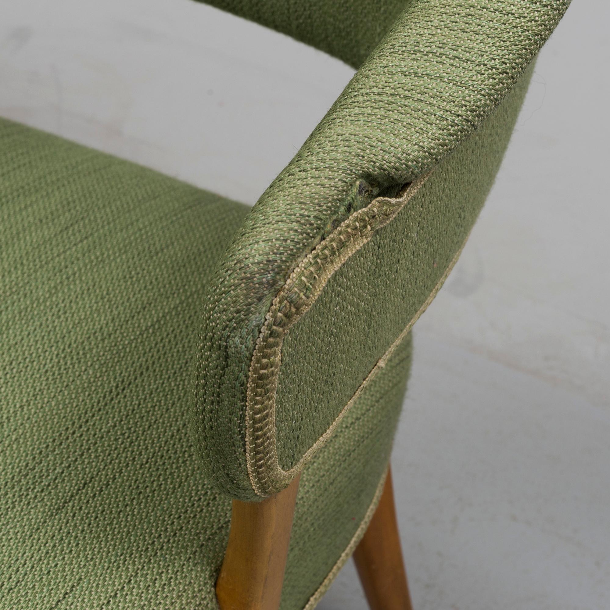 A "Lata Greven" armchair by Carl Malmsten.