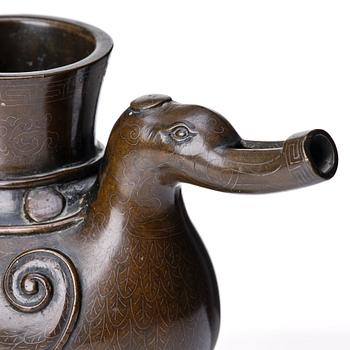 A bronze archaistic duck shaped vessel with silver inlay, Qing dynasty (1644-1912).