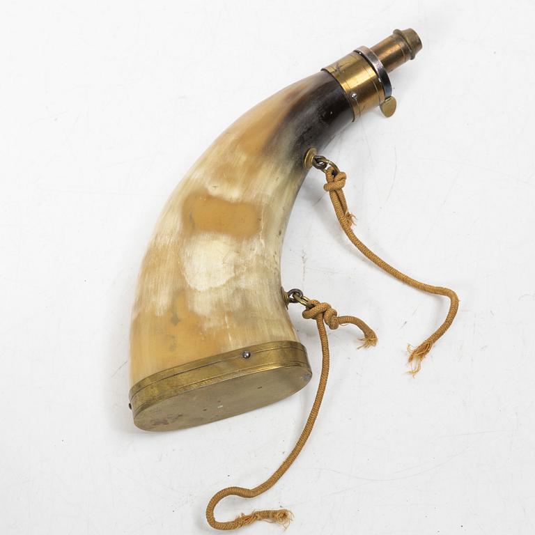 Two percussion cap containers 199th century, and two powder horns.