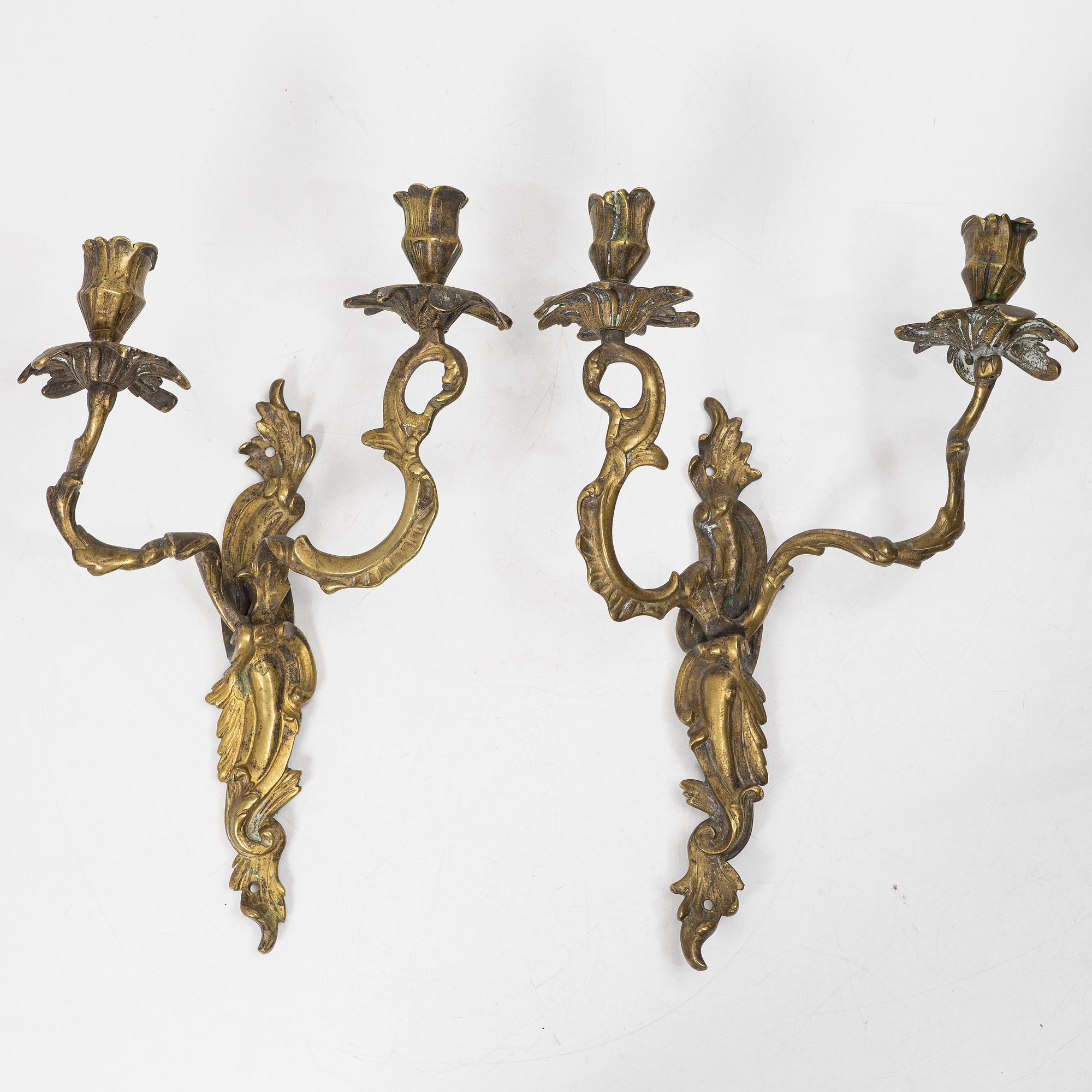 A pair of Rococo style wall sconces, 19th century.