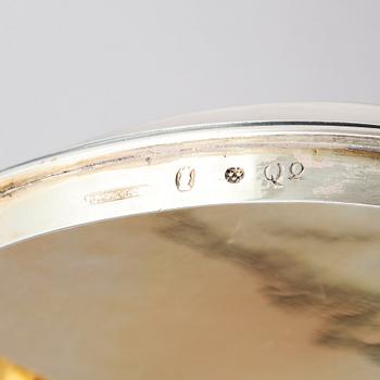 A silver suger bowl, marks of Johan Fredrik Wildt, Stockholm 1798, and a silver suger tong, Nils Arf, Stockholm 1799.