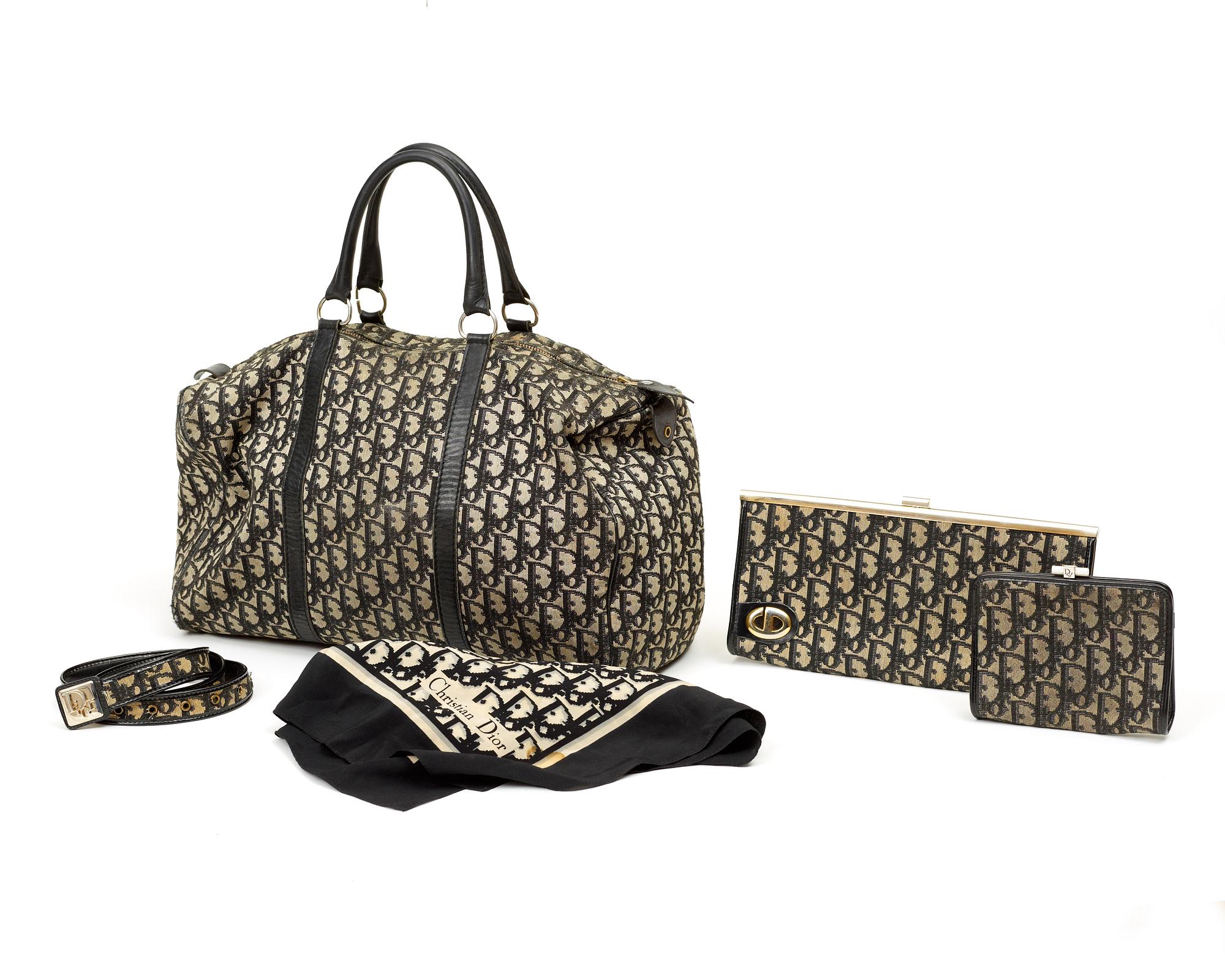 A monogram canvas five-piece-set consisting of a bag, belt, purse, scarf and clutch by Christian Dior.