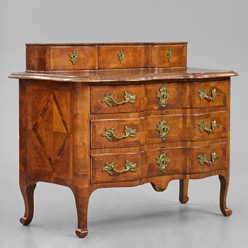 A late baroque walnut parquetry commode by C. Linning (master in Stockholm 1744-79).