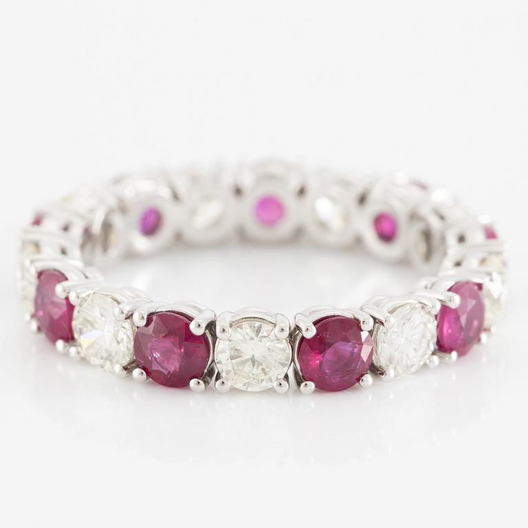 Ring, full eternity band, 18K white gold set with rubies and brilliant-cut diamonds.