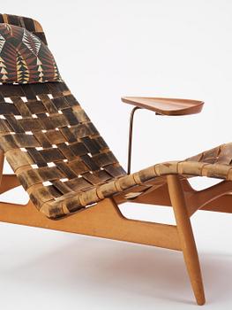 Arne Vodder, a woven leather lounge chair with attached side table, Bovirke, Denmark, 1950s.