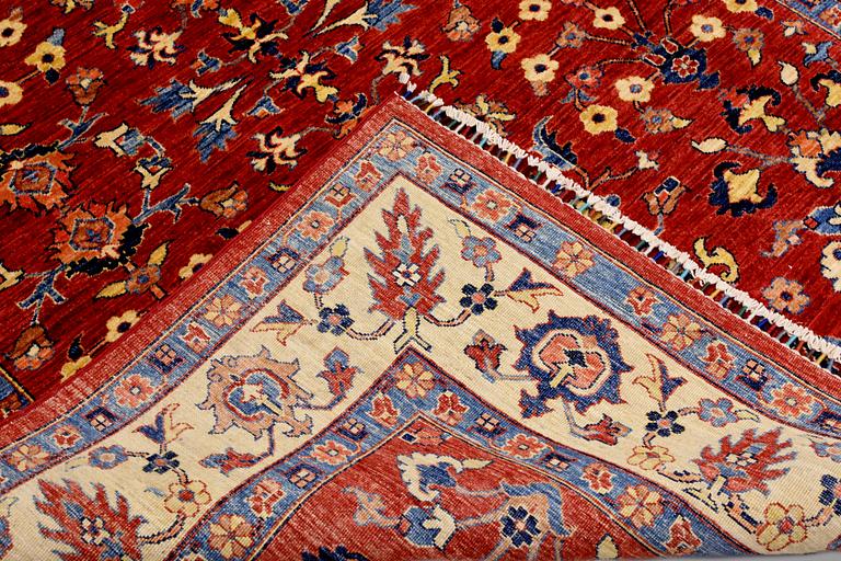 A rug, Ziegler design, approx. 246 x 177 cm.