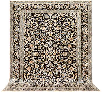 A Kashan carpet, a. 410 x 303 cm.