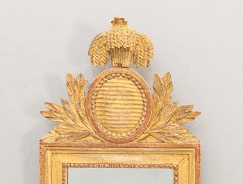 A Swedish gilded signed Gustavian mirror by CG Fyrwald.