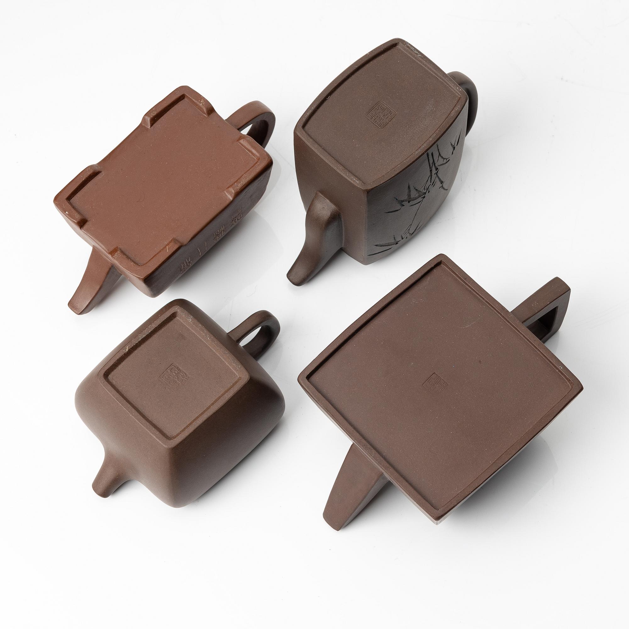 A group of four square yixing teapots, China, 1970/80s.